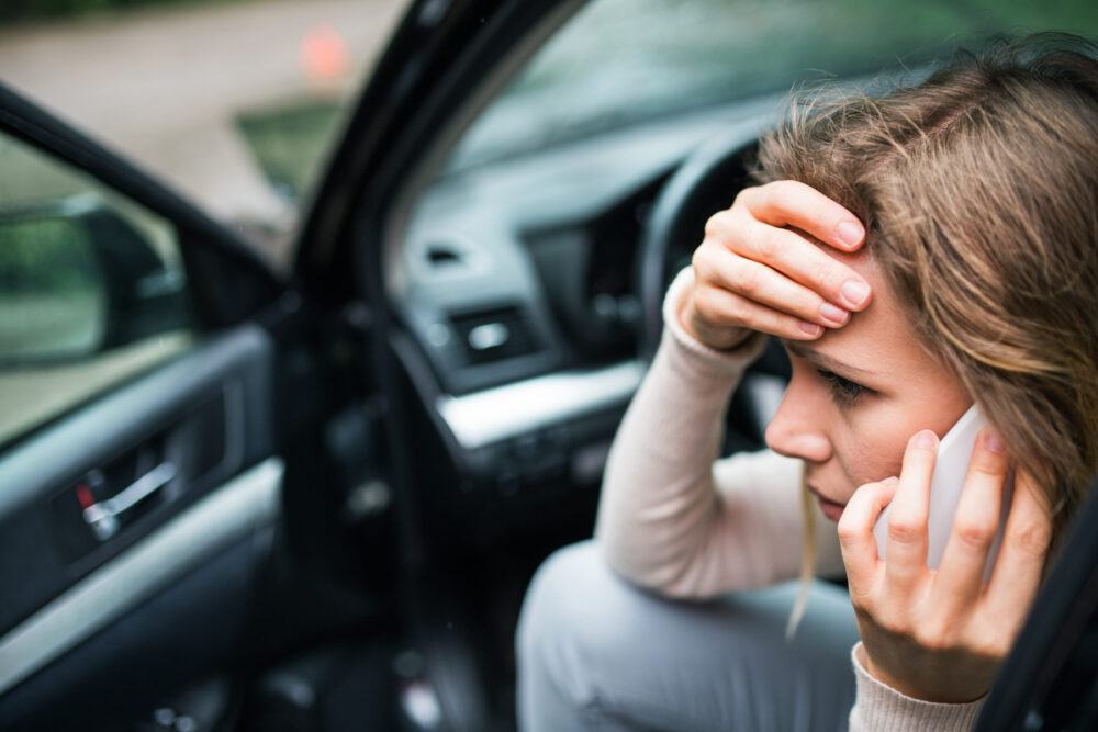 Frustrated woman car accident claim settlement
