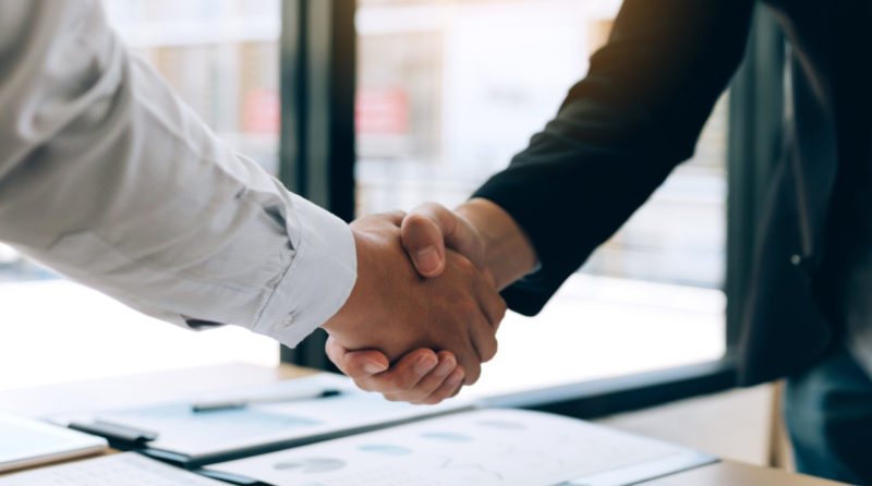 Hiring an attorney - shaking hands
